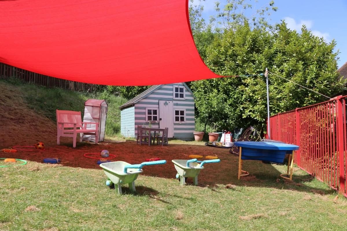 outdoor play area at the house that jack built nursery in Marlow